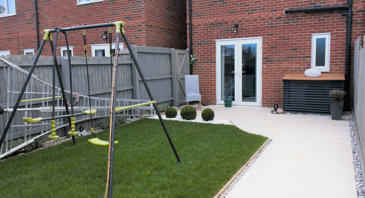 Grey fence for small garden