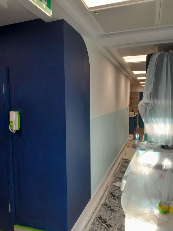 vibrant blue first coat painting office city of London