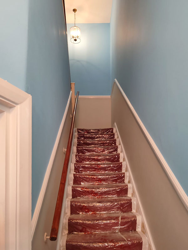 two tone hallway stairs