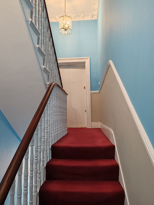 two tone hallway stairs