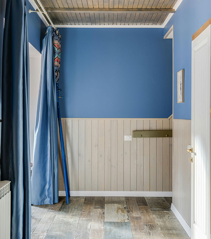 two tone hallway wall paneling beadboard